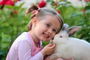 Girl and rabbit friends